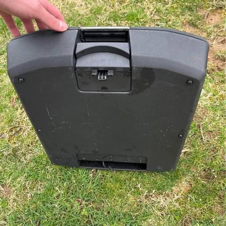 WhatsApp Image 2026-07-16 at 10.07.06 AM (1) Black OEM RAM center console lid assembly for RAM 1500 2500 and 3500